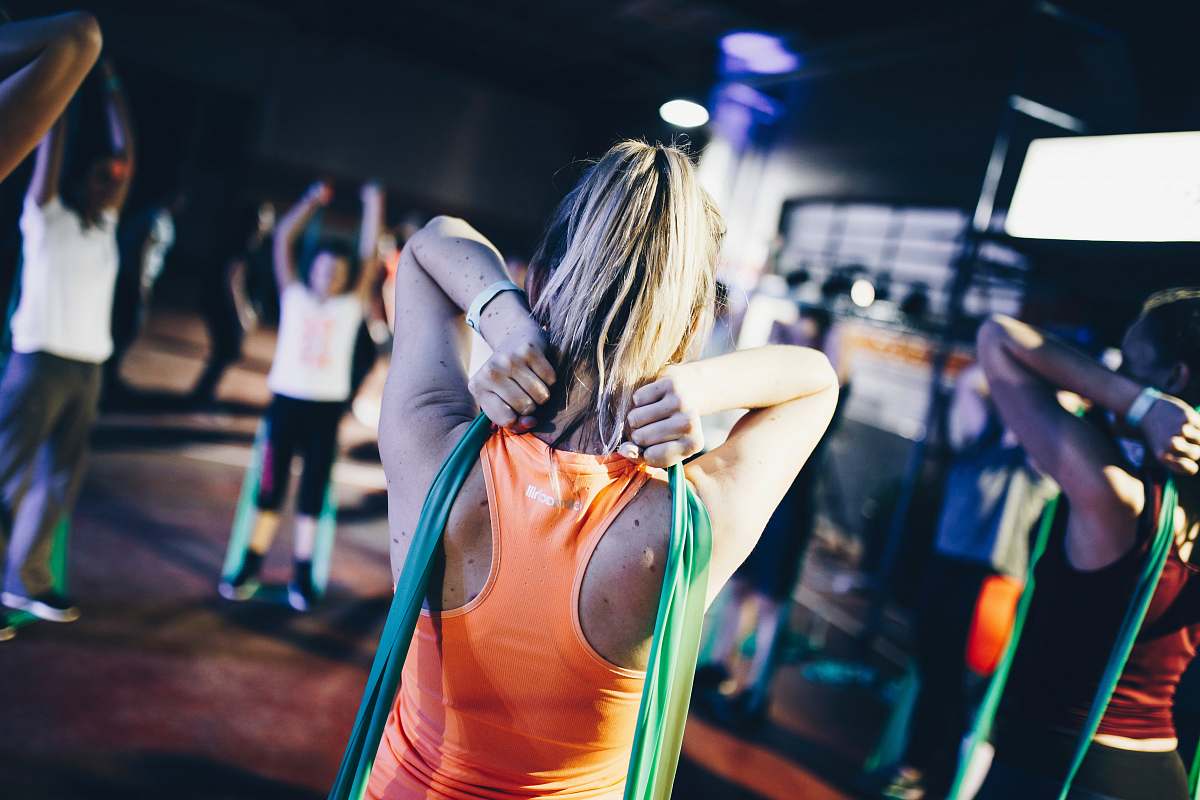 night life woman holding green rope at her back night club